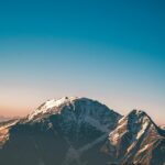 Mountain Landscapes - Stunning view of snow-capped mountains under a c #5151303